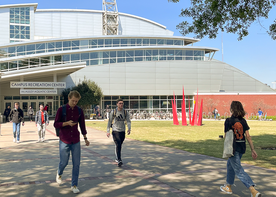 Students walking in front of the Campus Recreation